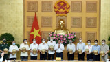 越南政府副总理范明正：科学家和医务人员是防疫工作的重要支柱