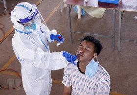 Laos warns people against Omicron variant