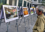 “烙印”的第三次新闻摄影展在河内举行