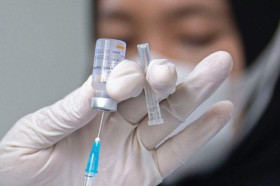 Indonesia licenses first home-grown COVID-19 vaccine