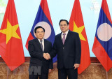 Báo chí Lào ca ngợi tình đoàn kết, hữu nghị đặc biệt với Việt Nam