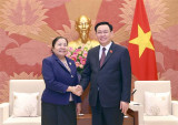 王廷惠会见老挝人民革命党中央组织部部长西赛•乐迪蒙颂一行