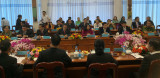 To improve the comprehensive cooperation between two districts Dau Tieng and Ba Chieng (Champasak, Laos)
