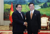 越南政府总理拜会老挝人民革命党总书记国家主席
