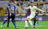 Ronaldo lập cú đúp trận thứ ba liên tiếp