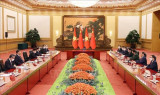 越南政府总理范明政会见中共中央总书记中国国家主席习近平