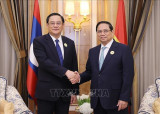 政府总理范明政会见老挝总理宋赛·西潘敦