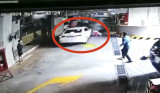 Một ô tô húc văng người phụ nữ dưới hầm xe của chung cư rồi bỏ chạy