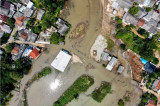 Floods, landslides kill at least 28 in Indonesia