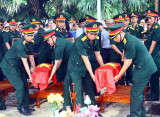 Quang Binh holds memorial, reburial services for martyrs' remains