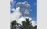 Indonesia’s Ibu volcano erupts, belching 7-km tower of ash