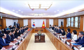 越南政府总理范明政访韩：发表越韩联合新闻公报