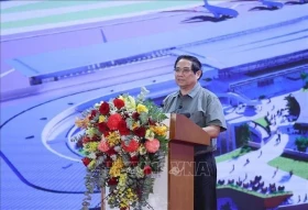 越南政府总理范明政主持越南全国80项重点项目开工和竣工仪式