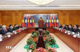 Dành ưu tiên cao nhất cho việc củng cố và tăng cường quan hệ Việt Nam-Lào
