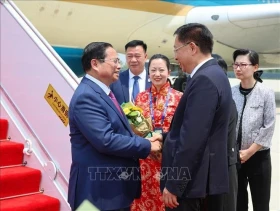 Vietnamese PM arrives in Tianjin for WEF meeting, working visit to China